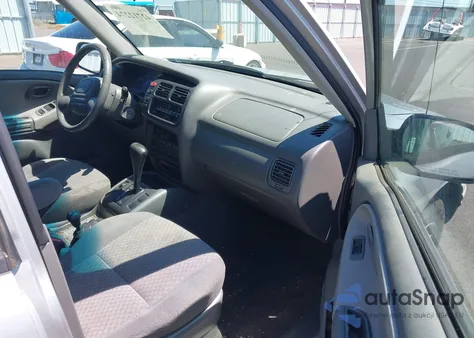 2003 Chevrolet Tracker Hard Top Base z USA, uszkodzony, nr VIN 2CNBJ13C036947628